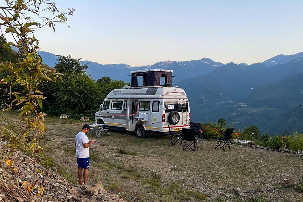 Caravan parked near mountains during weekend getaway