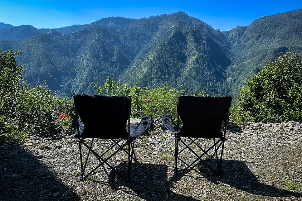 Caravan rental parked at hilltop campsite for family trip